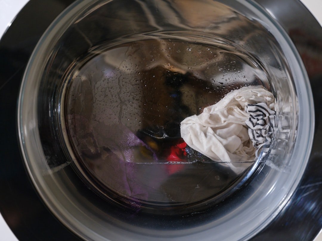 Washing machine drum with clothes and water