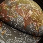 brown and white printed textile